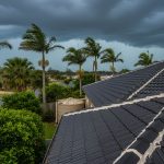 Brisbane suburban home under dark, stormy skies, showcasing a clean, well-maintained roof with fresh ridge pointing, symbolizing storm protection.
